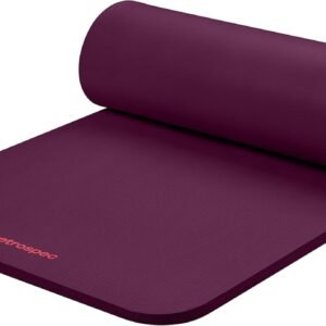 Retrospec Solana 1-inch thick yoga mat in Boysenberry color, partially rolled showing foam thickness